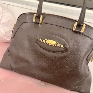 Gucci GG Signature Punch Bag